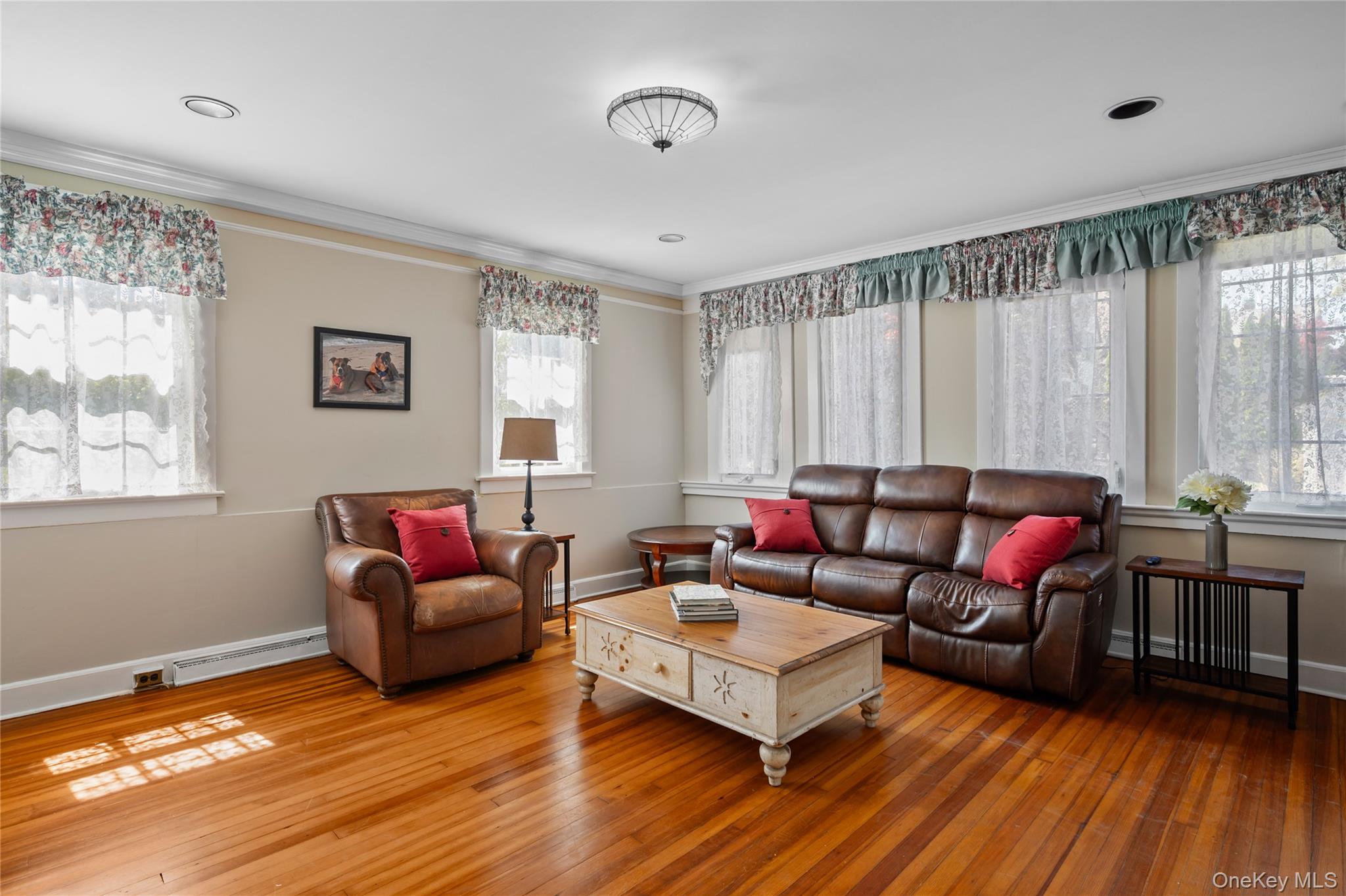 1 Pembroke Street New Rochelle, NY 10801 - Photo 10 of 47 Large windows make this a bright and cheerful room