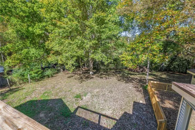 a view of a yard with plants