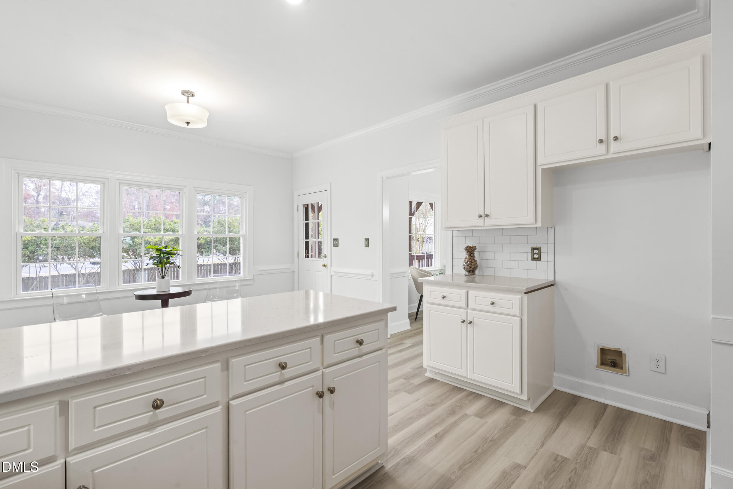 1213 Buxton Road Northwest Wilson, NC 27896 - Photo 13 of 36 a kitchen with white cabinets and white appliances