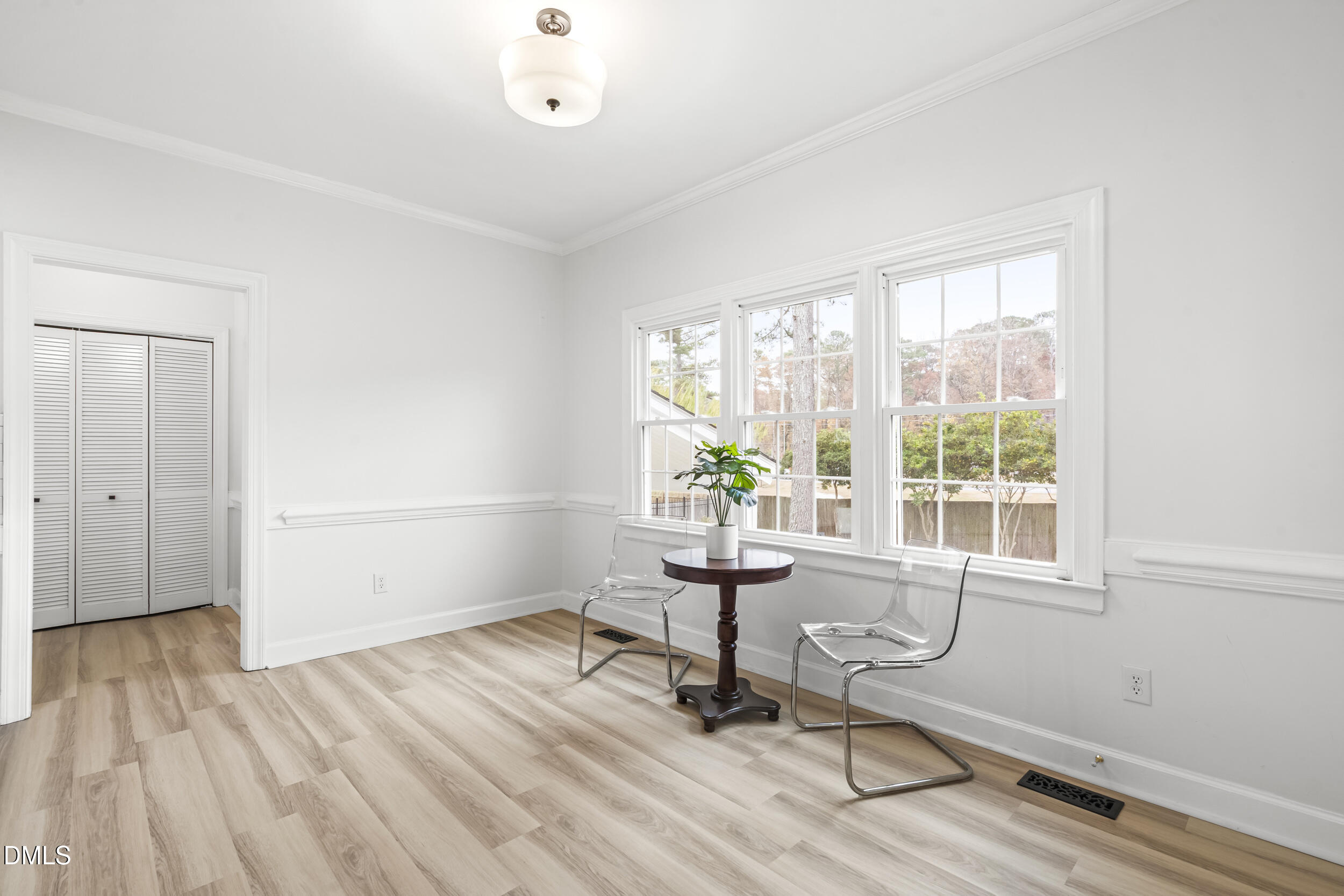 1213 Buxton Road Northwest Wilson, NC 27896 - Photo 15 of 36 a view of a room with wooden floor and windows
