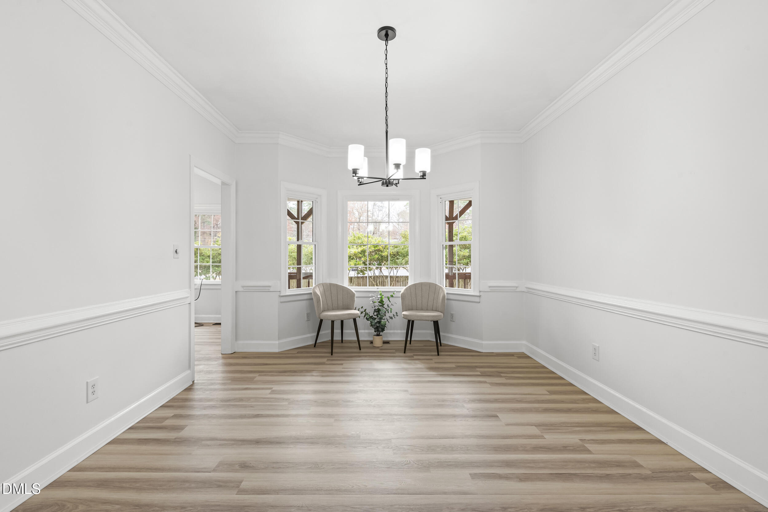 1213 Buxton Road Northwest Wilson, NC 27896 - Photo 17 of 36 a view of a dining room with furniture window and wooden floor