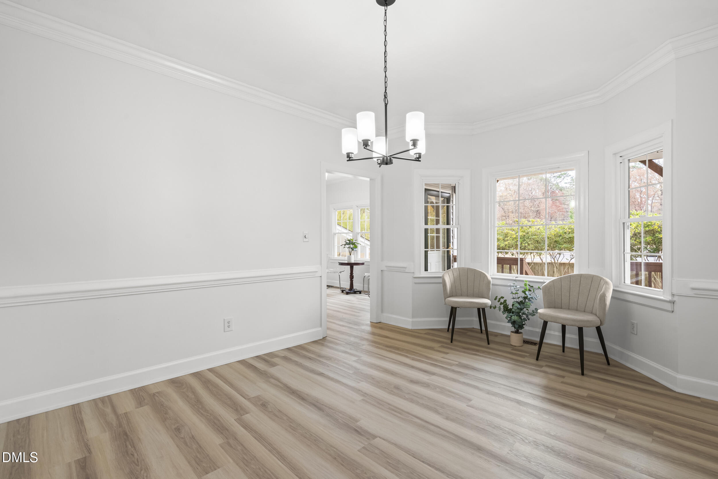 1213 Buxton Road Northwest Wilson, NC 27896 - Photo 18 of 36 a view of a livingroom with furniture window and wooden floor