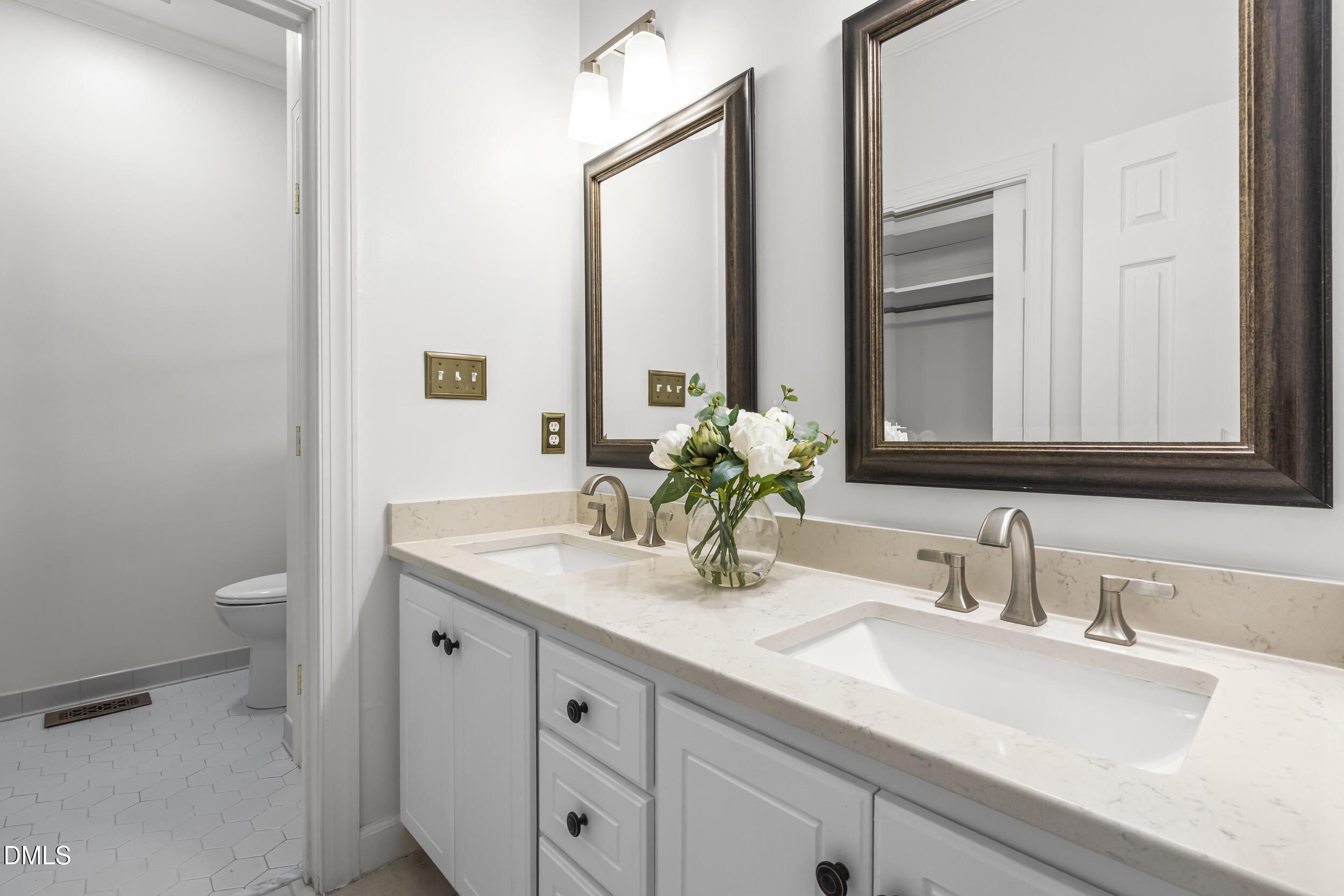 1213 Buxton Road Northwest Wilson, NC 27896 - Photo 21 of 36 a bathroom with a sink and a mirror