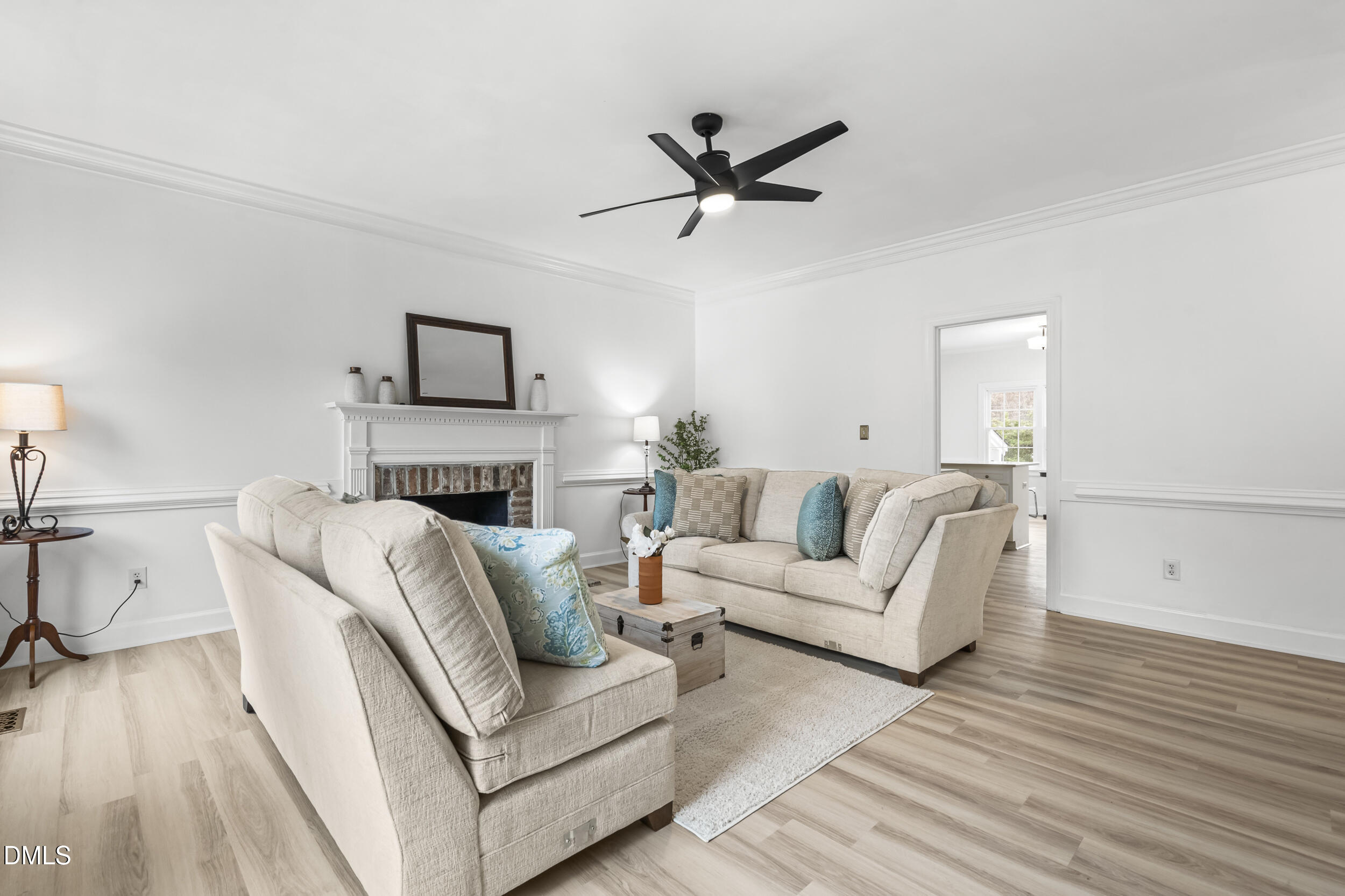 1213 Buxton Road Northwest Wilson, NC 27896 - Photo 6 of 36 a living room with furniture and a wooden floor