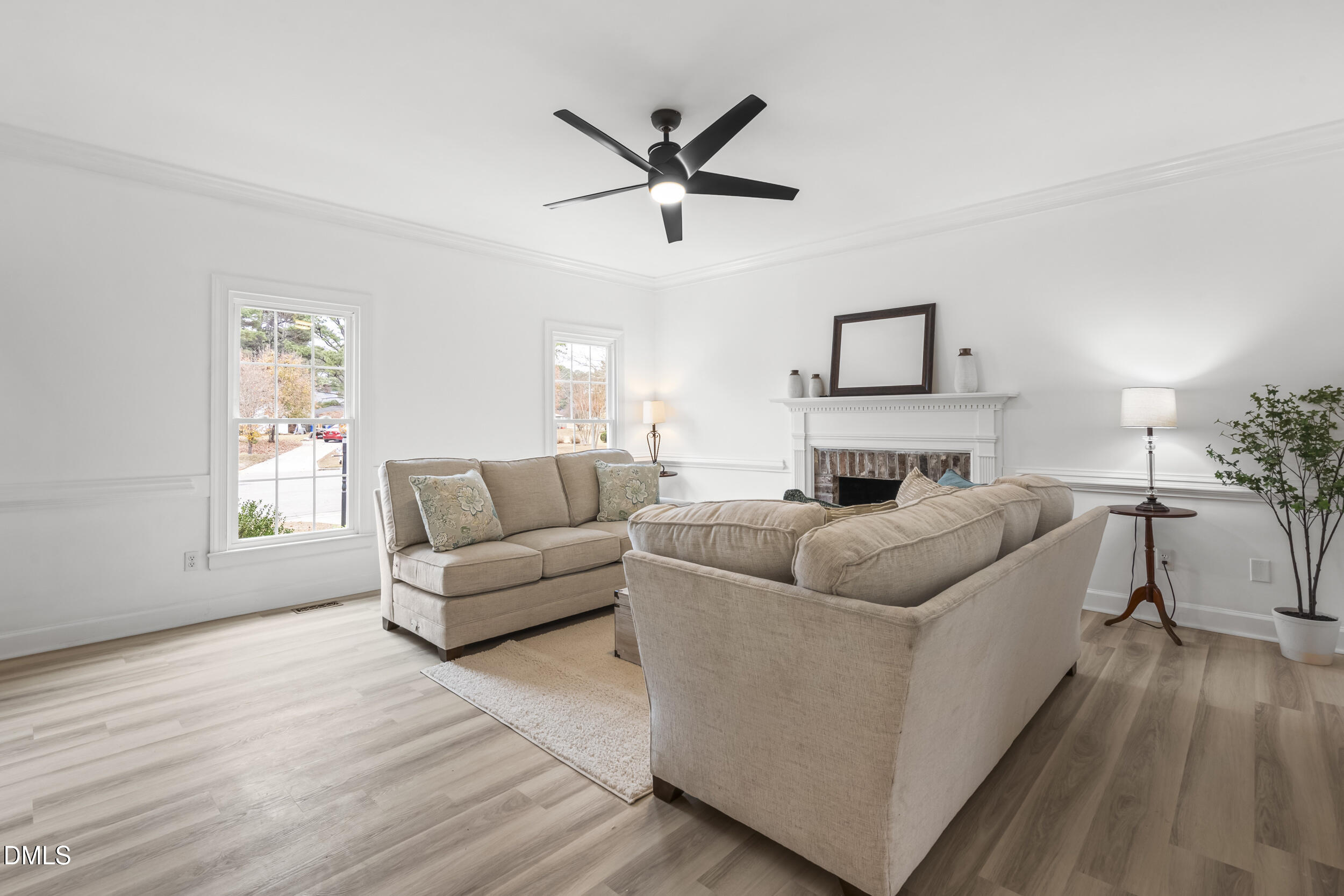 1213 Buxton Road Northwest Wilson, NC 27896 - Photo 8 of 36 a living room with furniture and a wooden floor