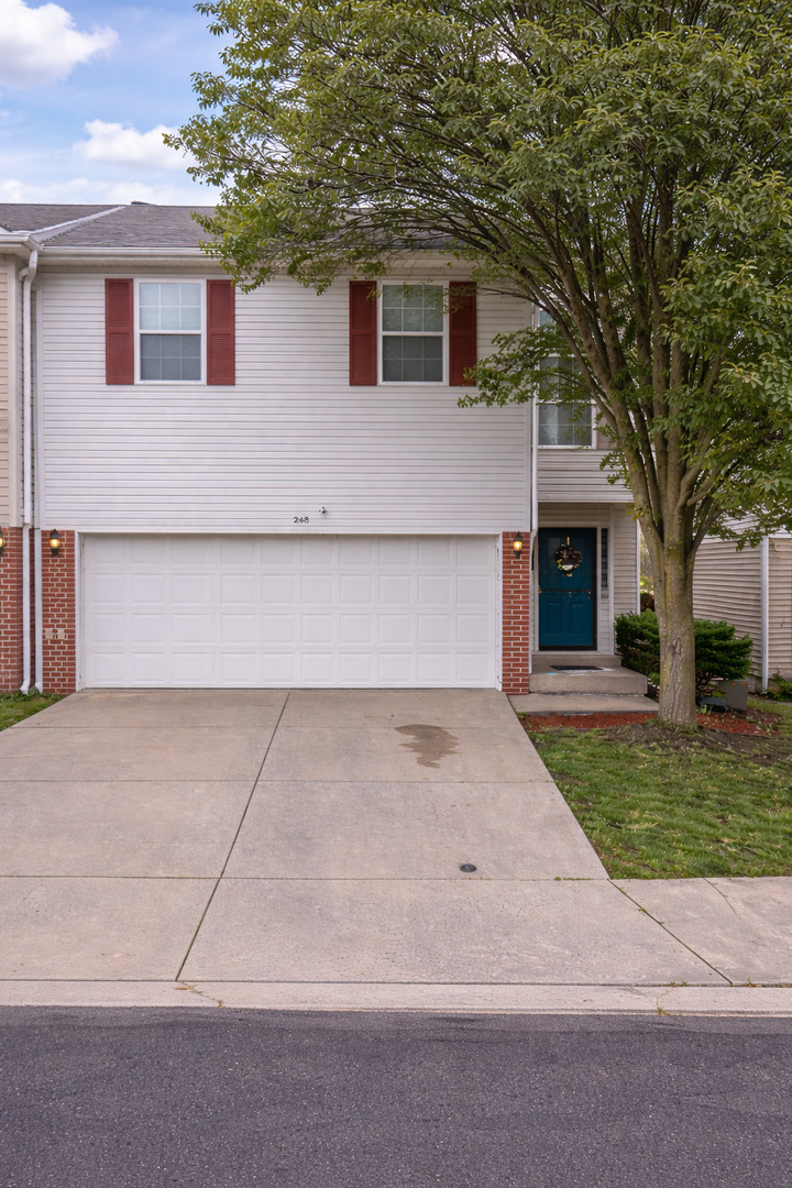248 Parktrail Road Normal, IL 61761 - Photo 1 of 1 front view of a house with a yard