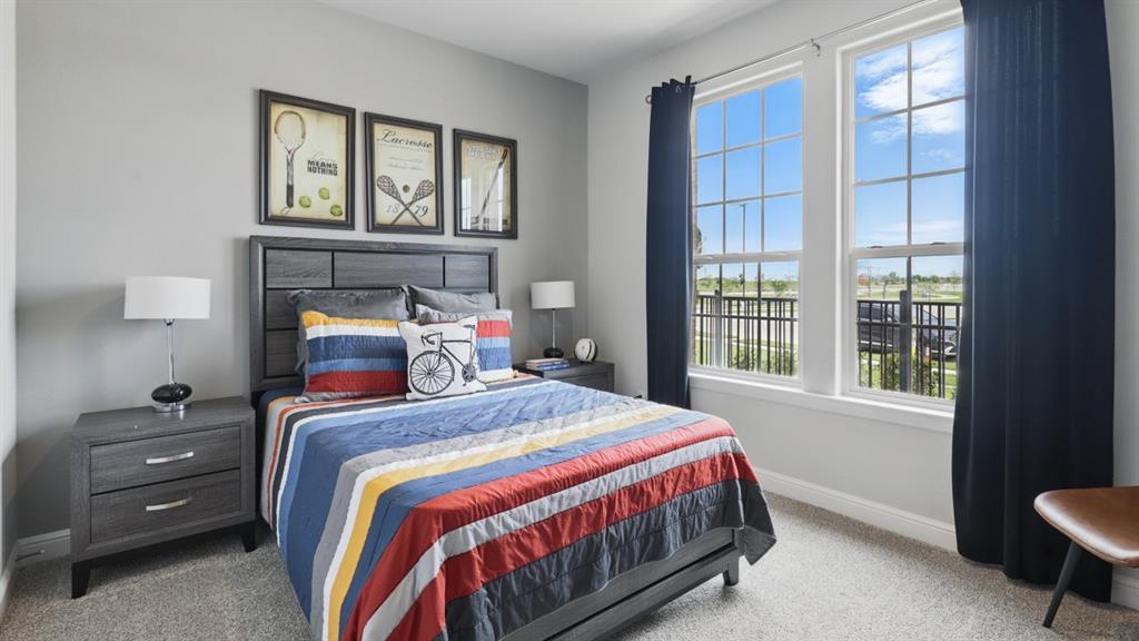 1919 Cherokee Lane Cleburne, TX 76033 - Photo 21 of 34 a bedroom with a bed and a window