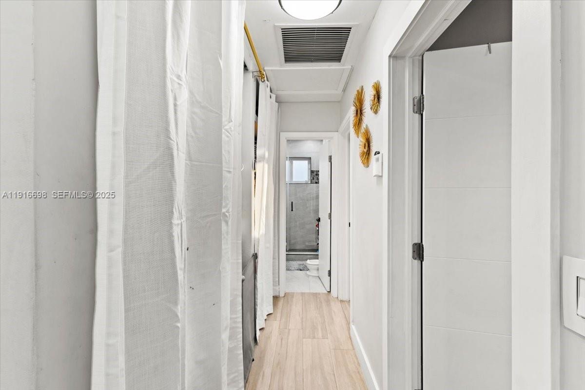 17121 Northwest 82nd Avenue Hialeah, FL 33015 - Photo 14 of 29 a view of a walk in closet