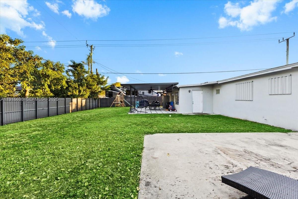 17121 Northwest 82nd Avenue Hialeah, FL 33015 - Photo 23 of 29 a view of a yard with a patio