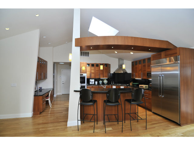 875 Riverside Drive Los Altos, CA 94024 - Photo 11 of 23 a kitchen with a table and chairs