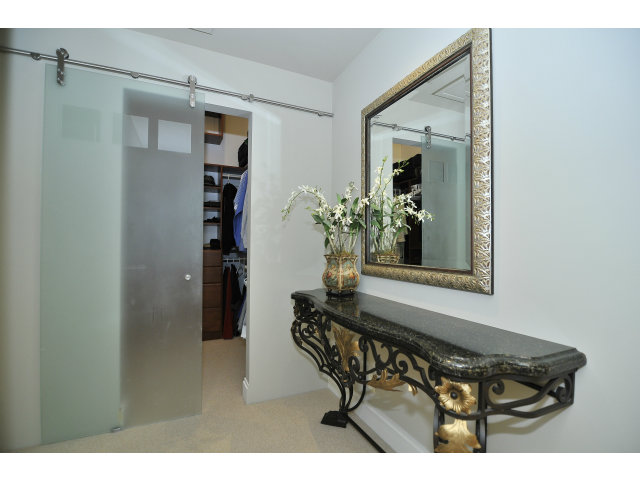 875 Riverside Drive Los Altos, CA 94024 - Photo 17 of 23 a dining room with a wooden table and chairs