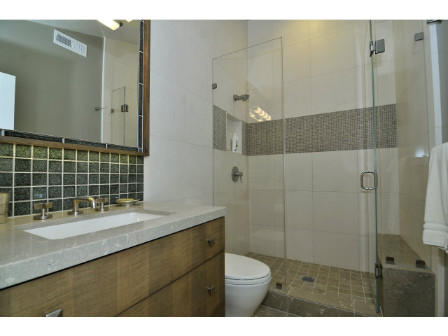 875 Riverside Drive Los Altos, CA 94024 - Photo 19 of 23 a bathroom with a sink a toilet and shower