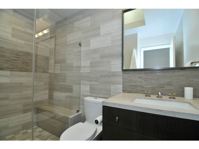 875 Riverside Drive Los Altos, CA 94024 - Photo 20 of 23 a bathroom with a sink mirror and a shower