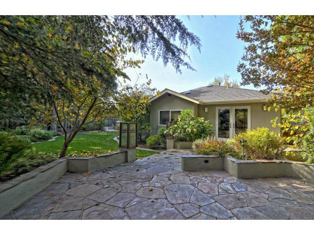 875 Riverside Drive Los Altos, CA 94024 - Photo 22 of 23 a view of a house with garden and a garden