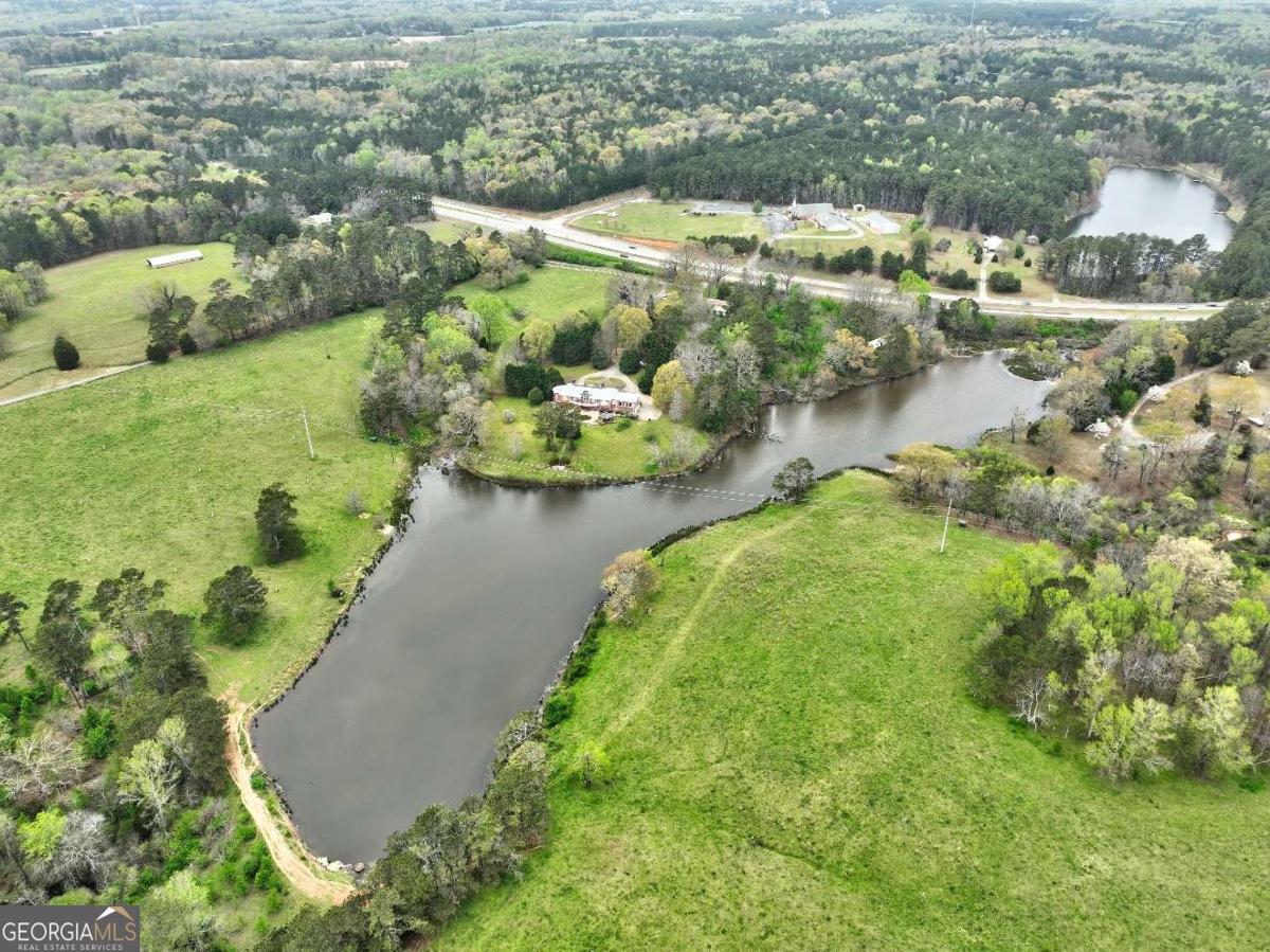 3571 Highway 20 Hampton, GA 30228 - Photo 12 of 35 an aerial view of residential houses with outdoor space