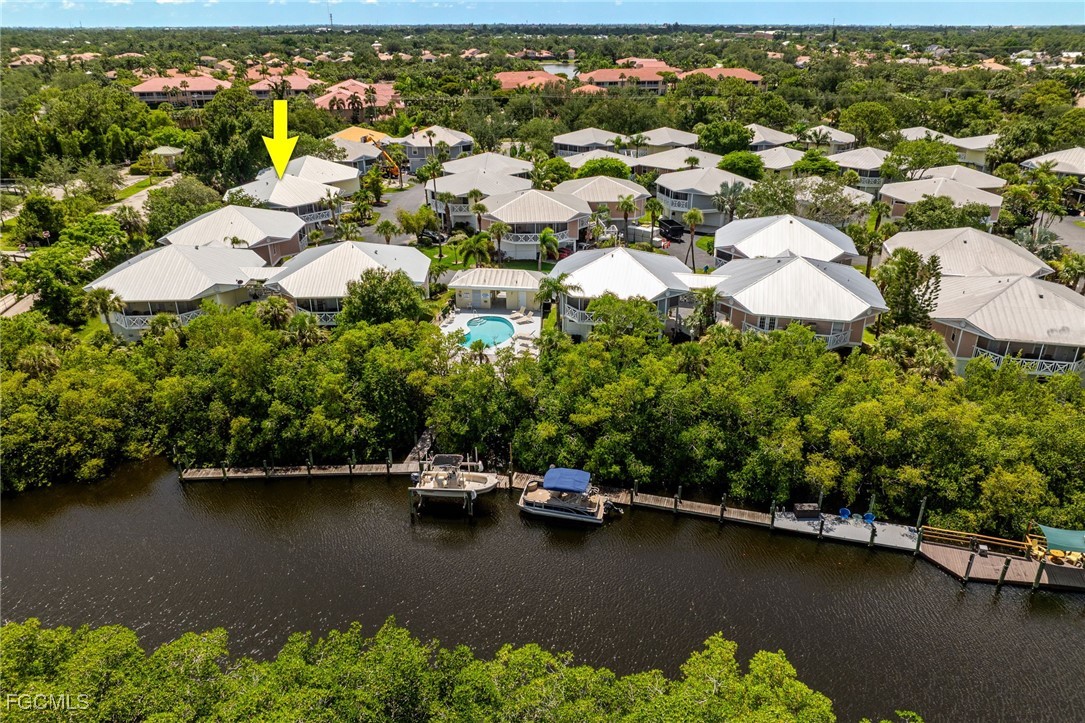950 Moody Road, Unit 124 North Fort Myers, FL 33903 - Photo 2 of 44 an aerial view of residential houses with outdoor space and lake view