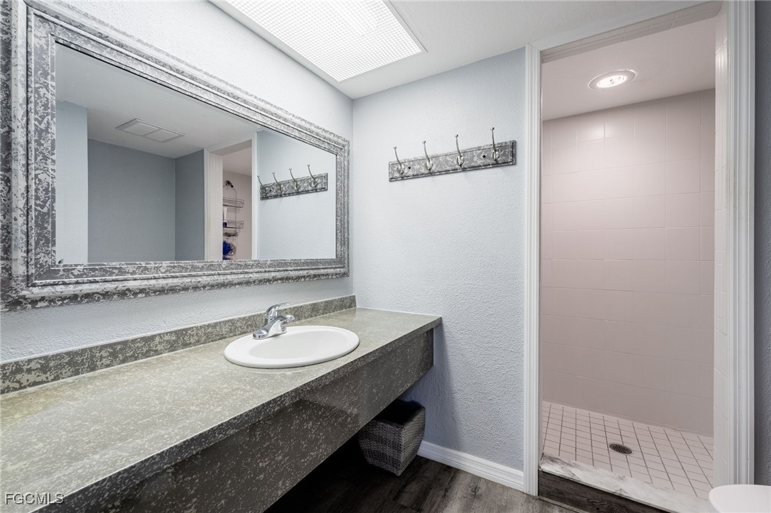 950 Moody Road, Unit 124 North Fort Myers, FL 33903 - Photo 25 of 44 a bathroom with a sink and a mirror