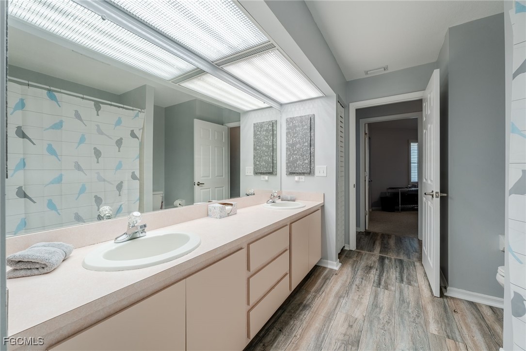 950 Moody Road, Unit 124 North Fort Myers, FL 33903 - Photo 28 of 44 a bathroom with a sink and a mirror
