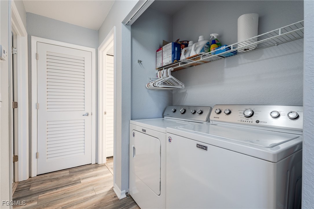 950 Moody Road, Unit 124 North Fort Myers, FL 33903 - Photo 30 of 44 a utility room with dryer and washer