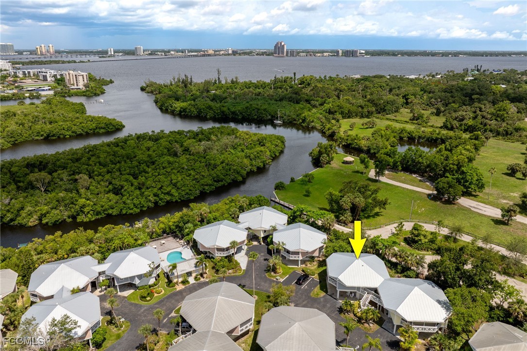 950 Moody Road, Unit 124 North Fort Myers, FL 33903 - Photo 37 of 44 a view of a lake with a outdoor space