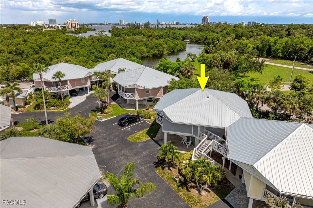 950 Moody Road, Unit 124 North Fort Myers, FL 33903 - Photo 39 of 44 an aerial view of a house with swimming pool and mountain view