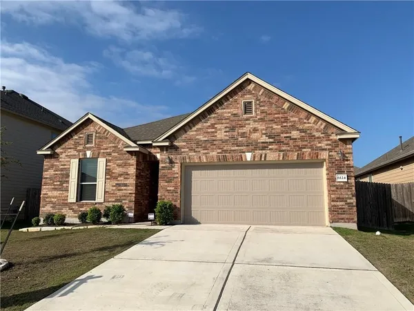 a view of a house with garage