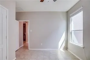 a view of an empty room and window
