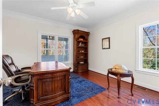 a room with furniture and wooden floor