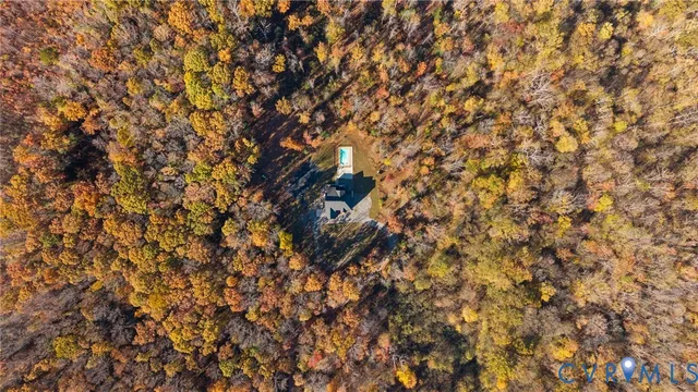a view of a house with a swimming pool