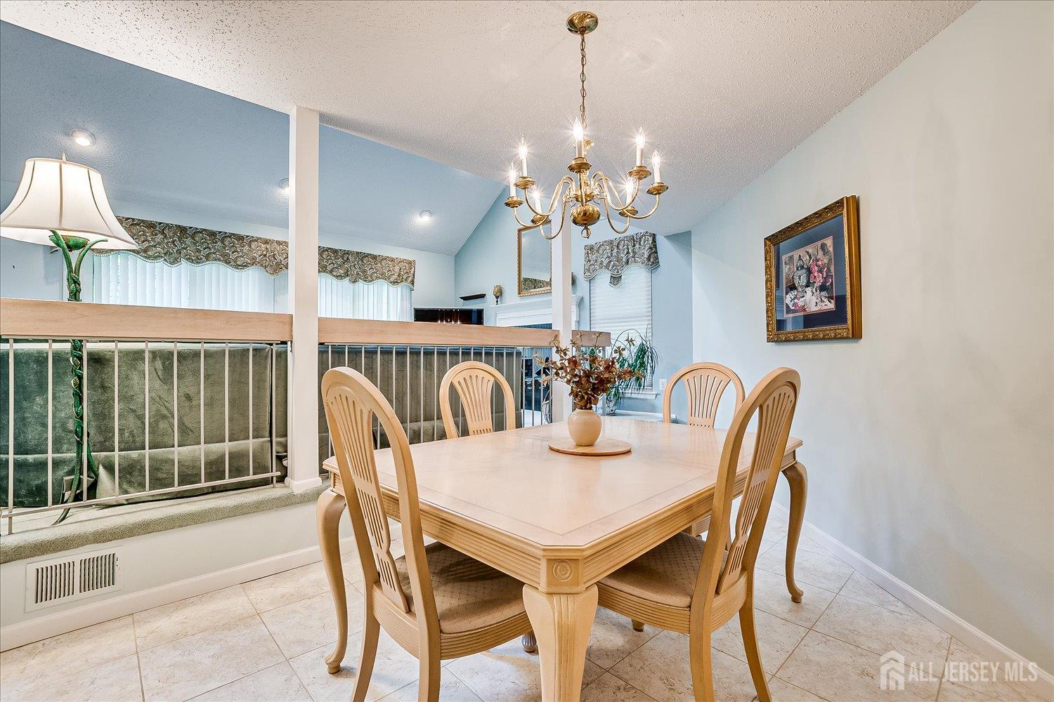 75 Kelly Drive Edison, NJ 08820 - Photo 20 of 41 a view of a dining room with furniture window and outside view