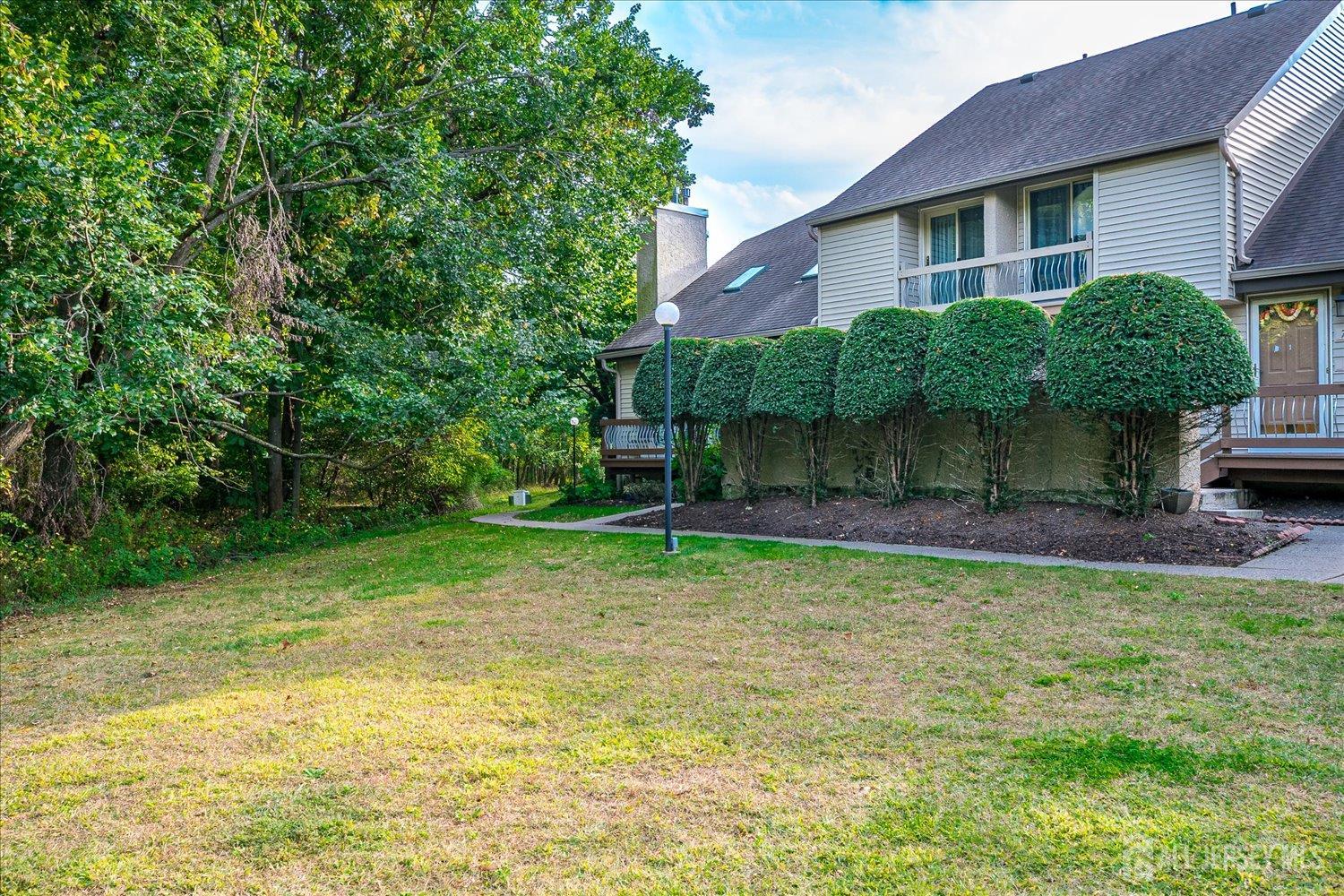 75 Kelly Drive Edison, NJ 08820 - Photo 2 of 41 a view of a house with a yard and plants