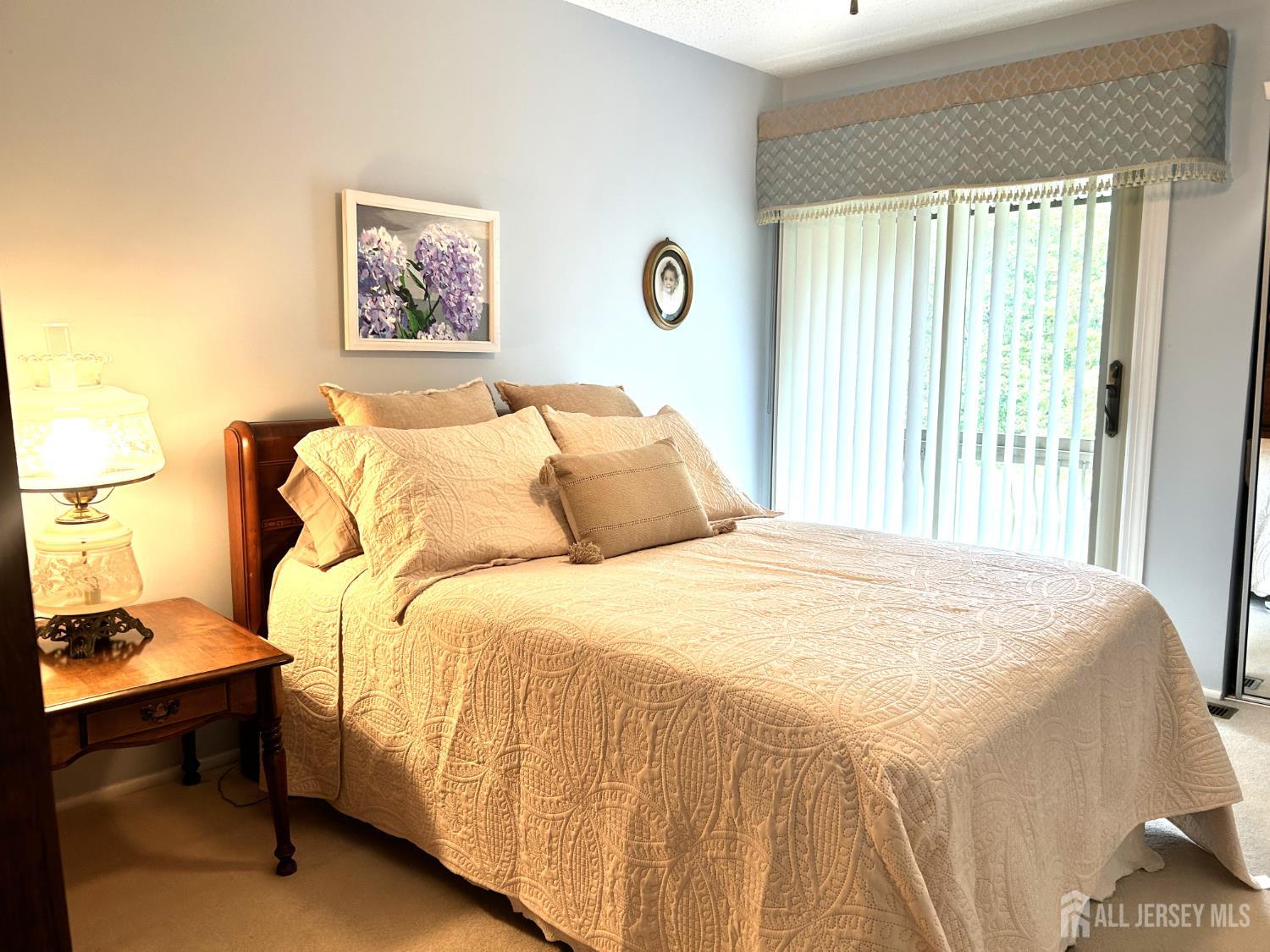 75 Kelly Drive Edison, NJ 08820 - Photo 24 of 41 a bedroom with a bed and a window