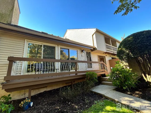 a house view with a garden space