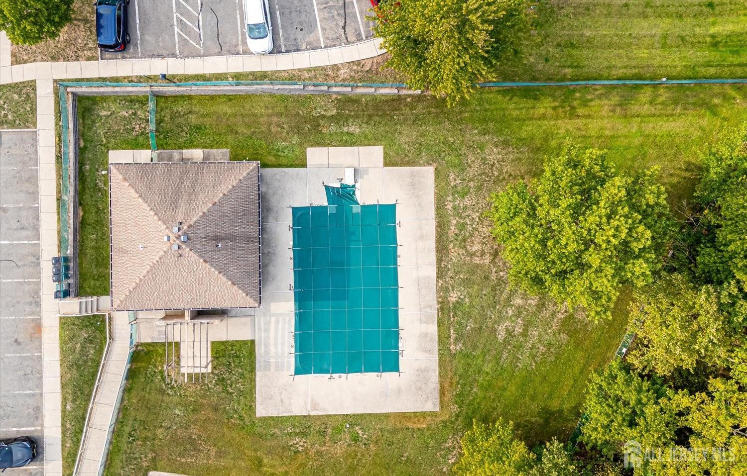 75 Kelly Drive Edison, NJ 08820 - Photo 32 of 41 a view of an house with backyard space and lake view