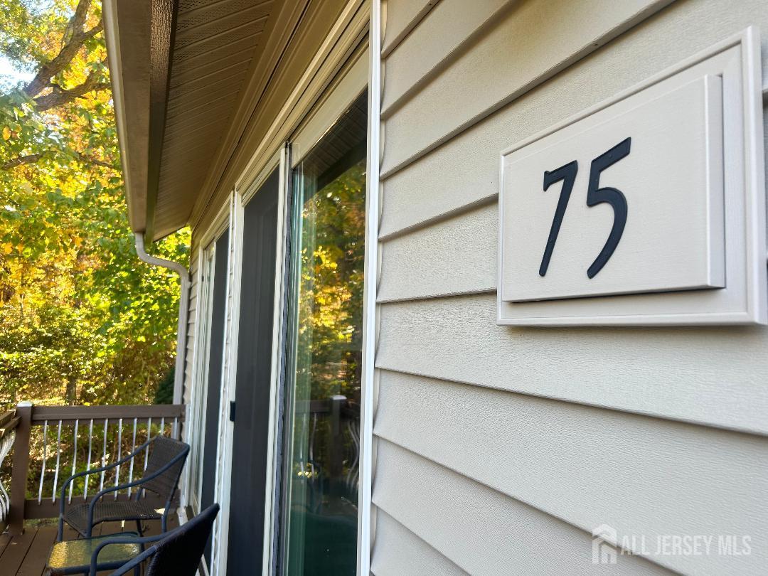 75 Kelly Drive Edison, NJ 08820 - Photo 6 of 41 a close up of a street sign
