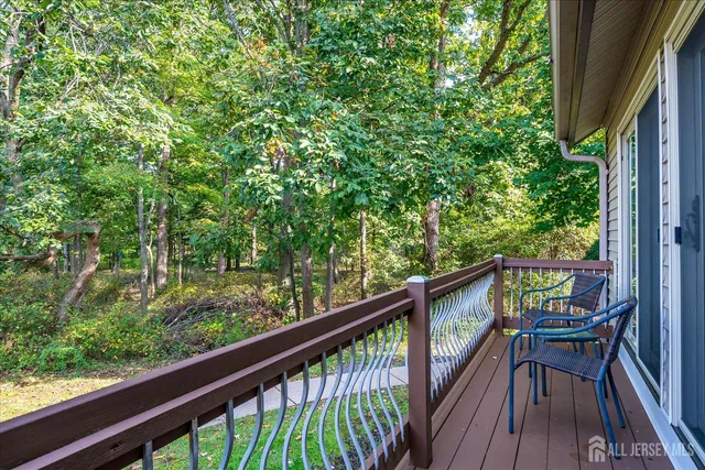 a view of balcony with furniture