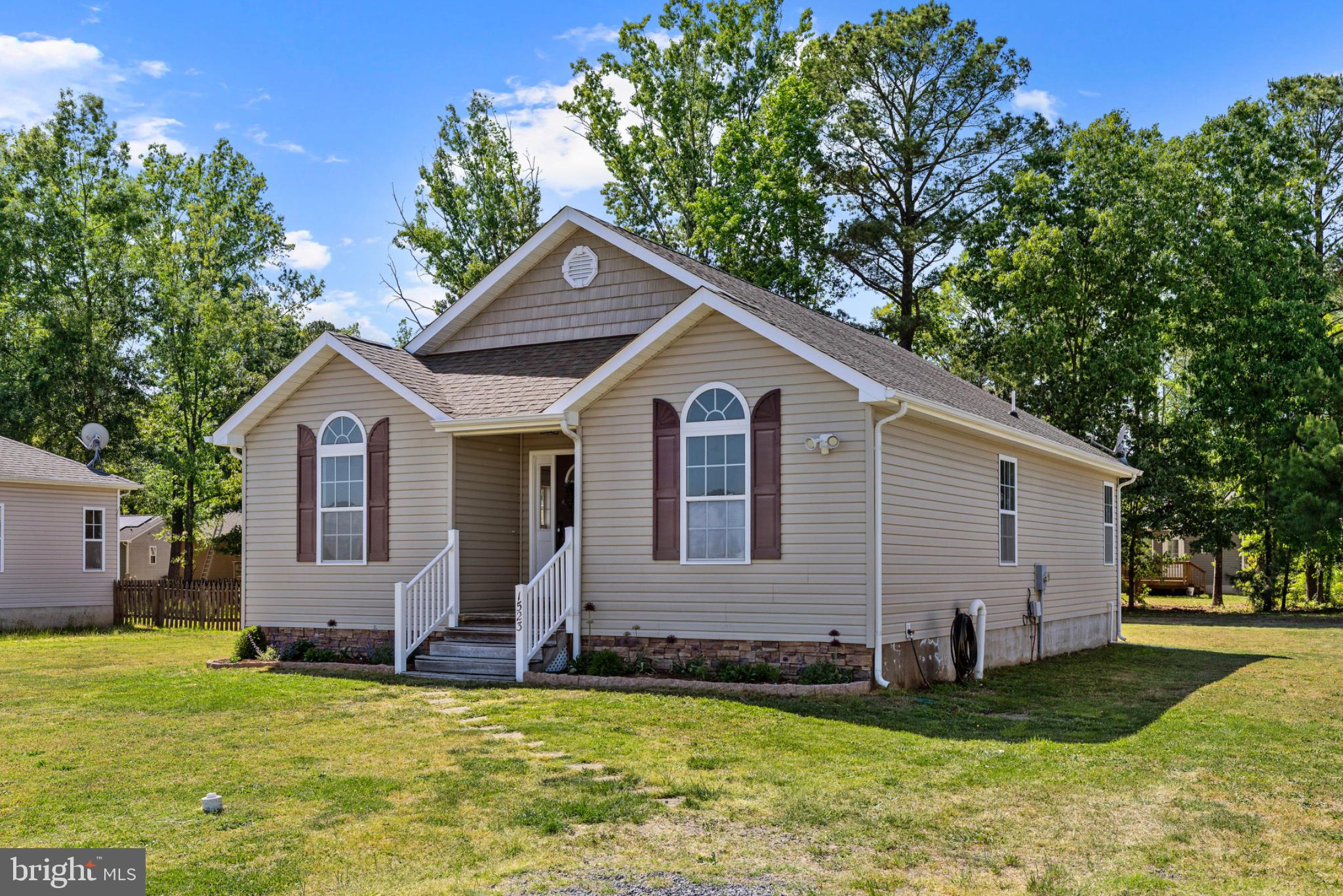 1523 Bowie Road Colonial Beach, VA 22443 - Photo 32 of 34 a view of a house with a yard