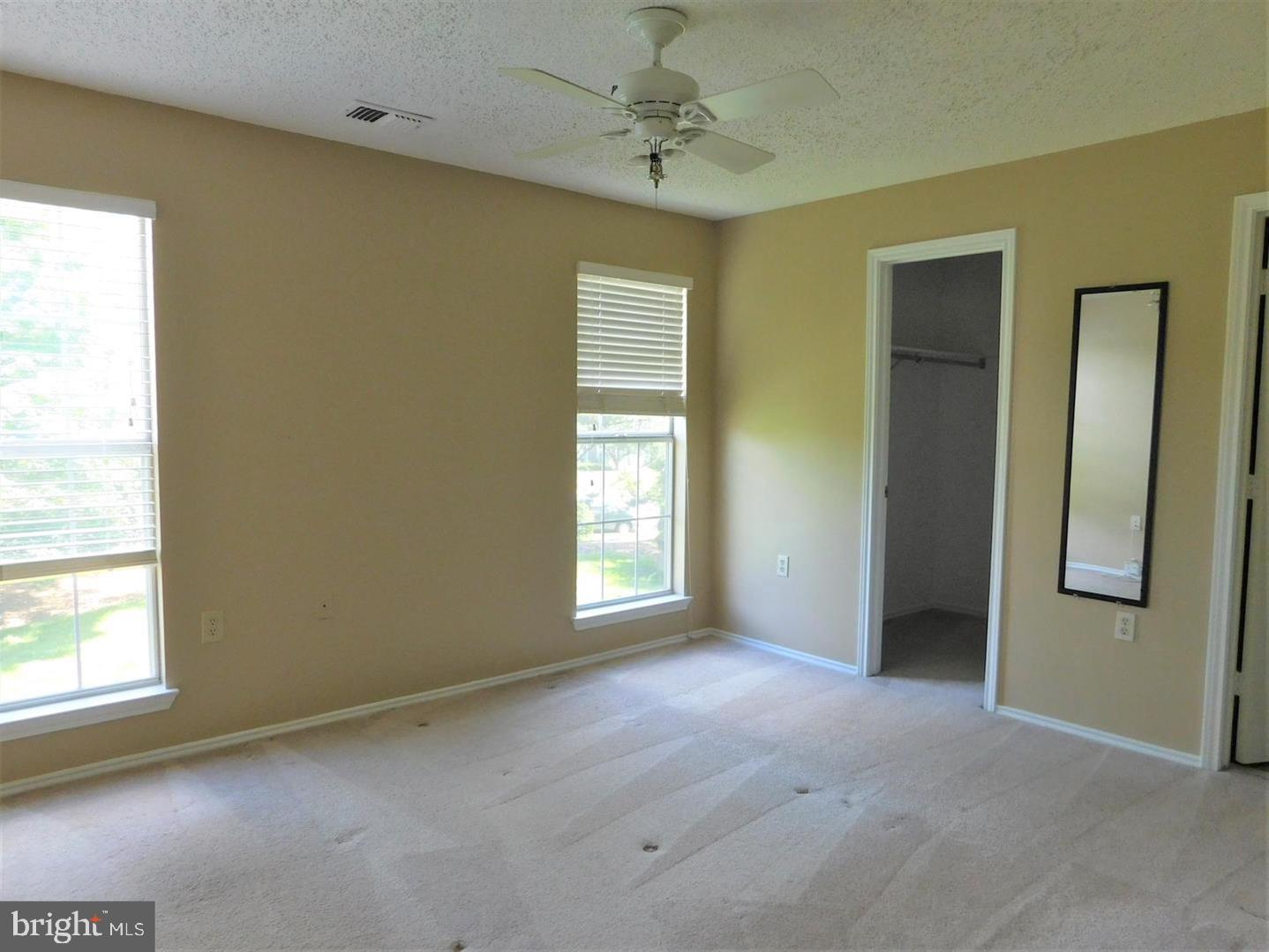 20958 Timber Ridge Terrace, Unit 203 Ashburn, VA 20147 - Photo 11 of 18 MASTER BEDROOM W./ WIC