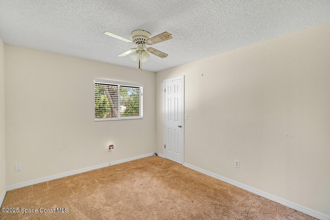 475 Hurst Road Northeast Palm Bay, FL 32907 - Photo 30 of 36 Guest Bedroom