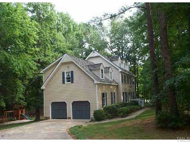 405 Baytree Lane Raleigh, NC 27615 - Photo 1 of 1 a front view of a house with garden