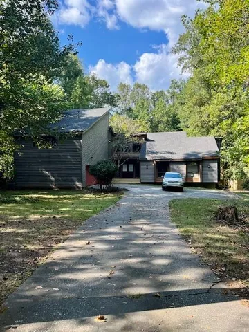 a car parked in front of a house
