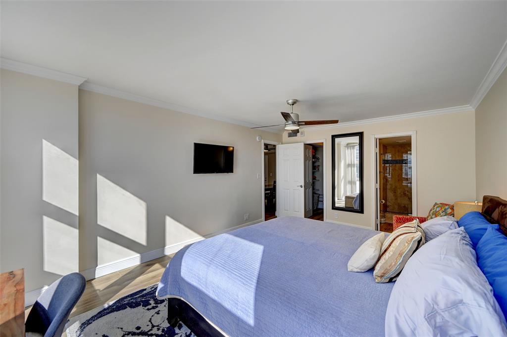 531 North Ocean Boulevard, Unit 506 Pompano Beach, FL 33062 - Photo 17 of 47 a bed room with a bed and a television