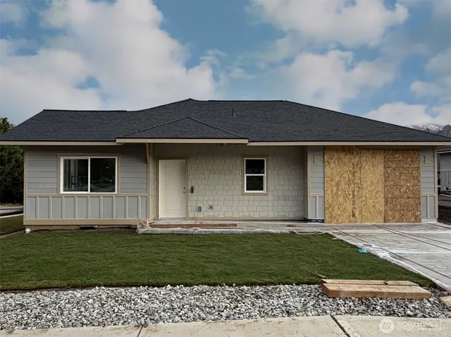 a house view with a garden space
