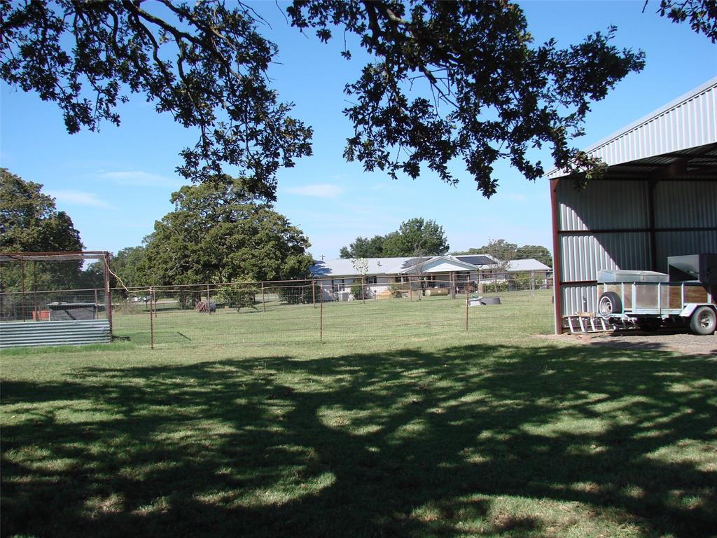 34 Denton Road Gordonville, TX 76245 - Photo 13 of 35 View of yard with an outbuilding