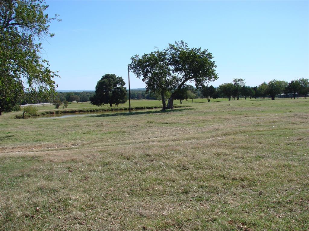 34 Denton Road Gordonville, TX 76245 - Photo 16 of 35 View of grassy yard featuring a view of rural / pastoral area