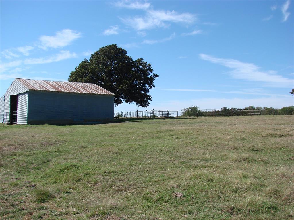 34 Denton Road Gordonville, TX 76245 - Photo 19 of 35 View of yard with an outbuilding