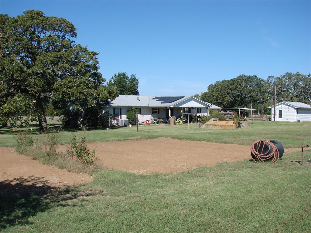 34 Denton Road Gordonville, TX 76245 - Photo 2 of 35 View of home's community with a yard