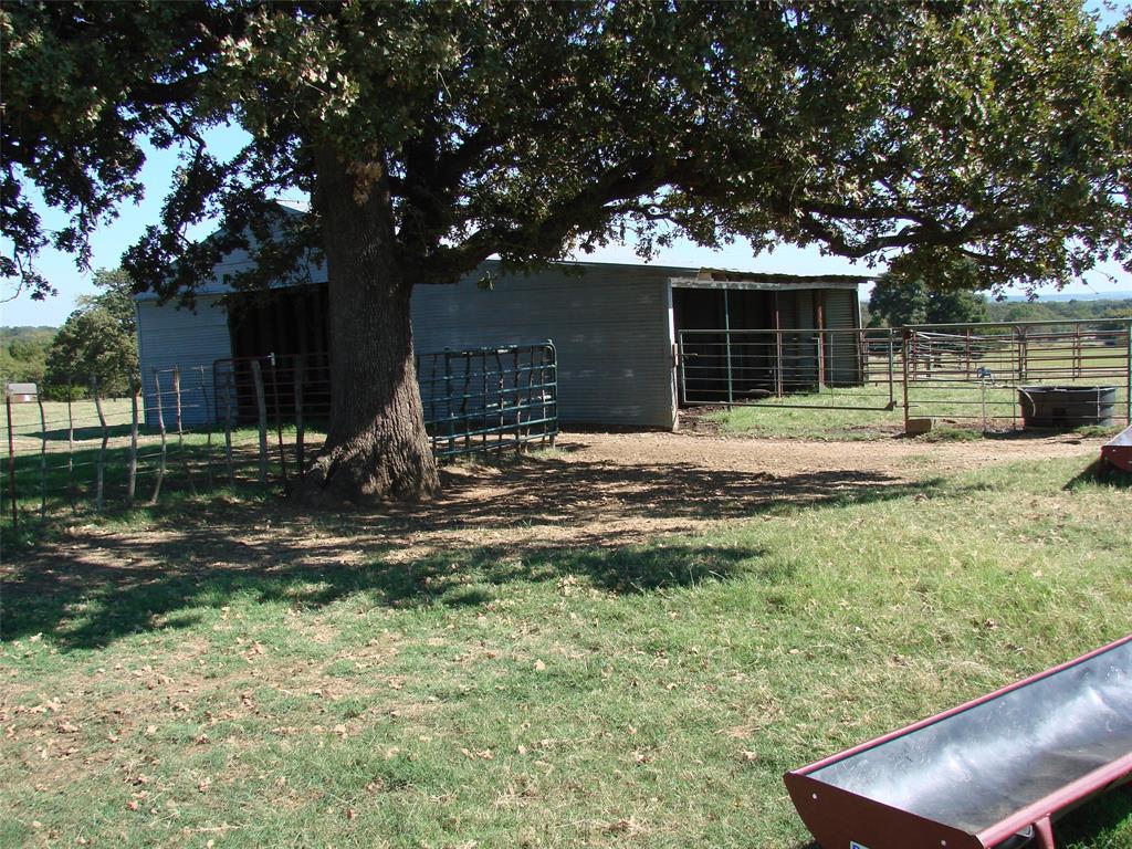 34 Denton Road Gordonville, TX 76245 - Photo 28 of 35 View of yard with an outdoor structure