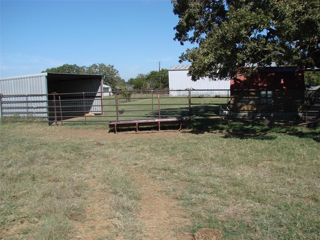 34 Denton Road Gordonville, TX 76245 - Photo 29 of 35 View of yard with an outdoor structure