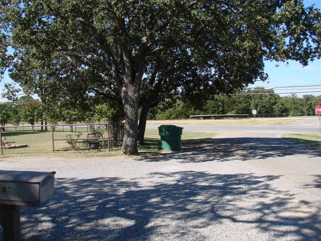 34 Denton Road Gordonville, TX 76245 - Photo 31 of 35 View of asphalt street featuring traffic signs